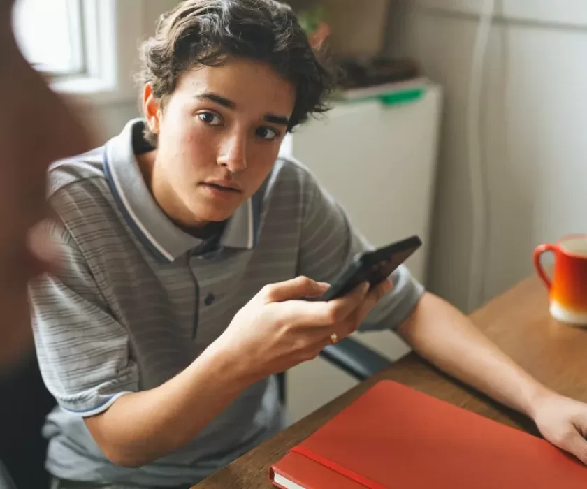 small business owner checking Instagram AI subscription features on a smartphone