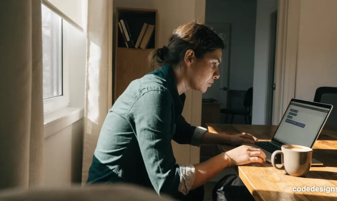 Small business owner reviewing an OpenAI Presence AI customer support chat conversation on a laptop