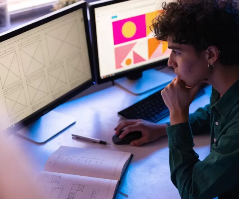 Web designer working on website wireframes, representing web design Cyprus services